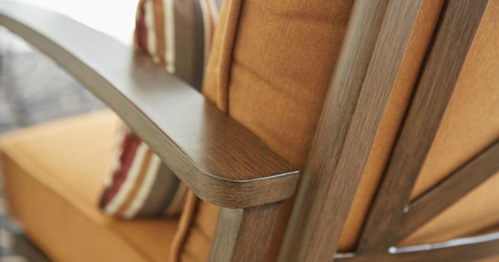 close up of wood looking patio chair 