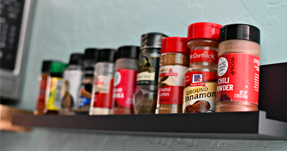 command ledge shelf with spices in it