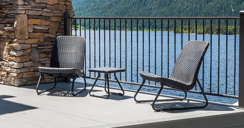 table and chair set on the lake