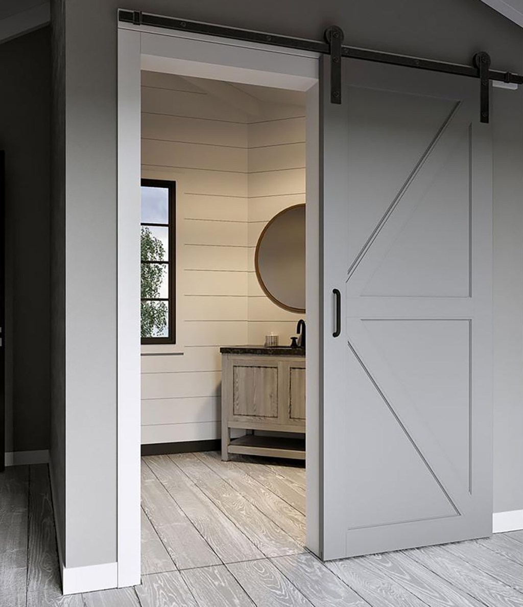 grey sliding barn door on bathroom