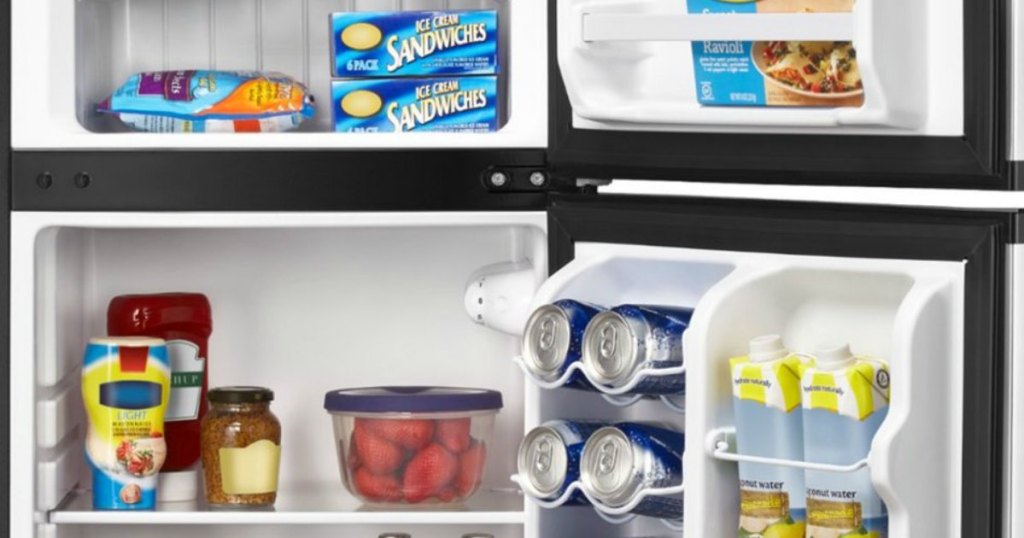 inside of fridge/freezer with food and drinks stored 