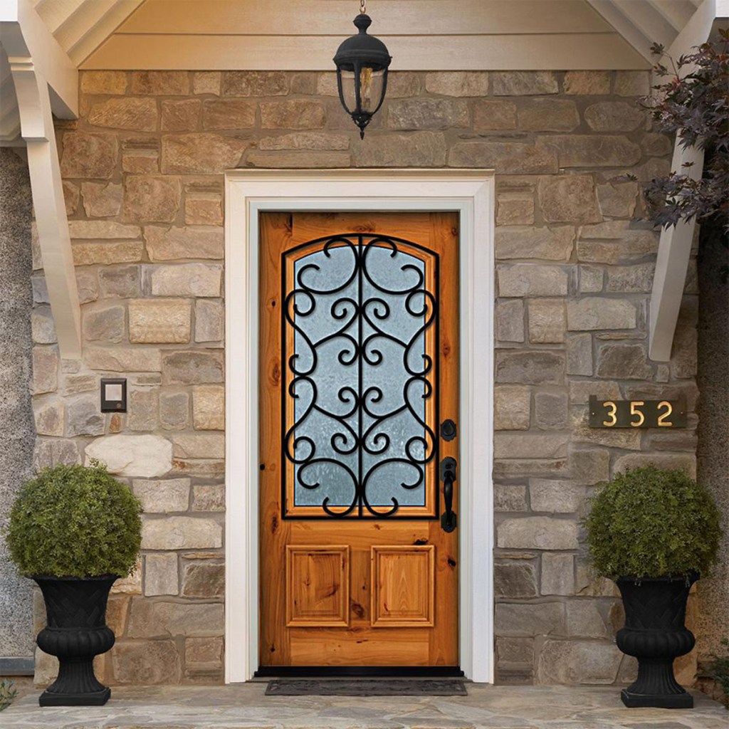 front door with iron adornments