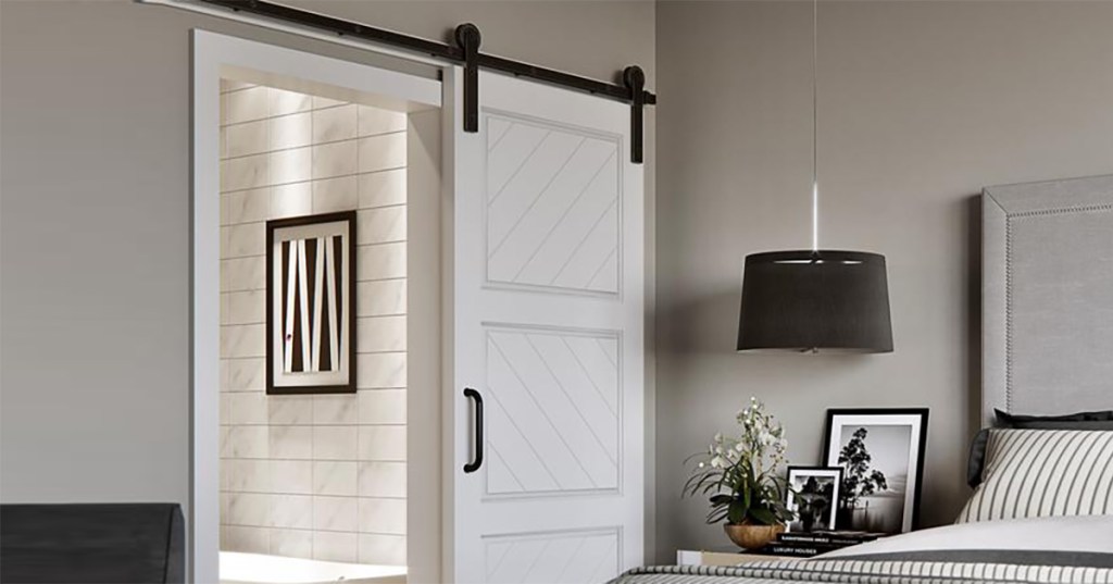 sliding barn door in bed room into bathroom