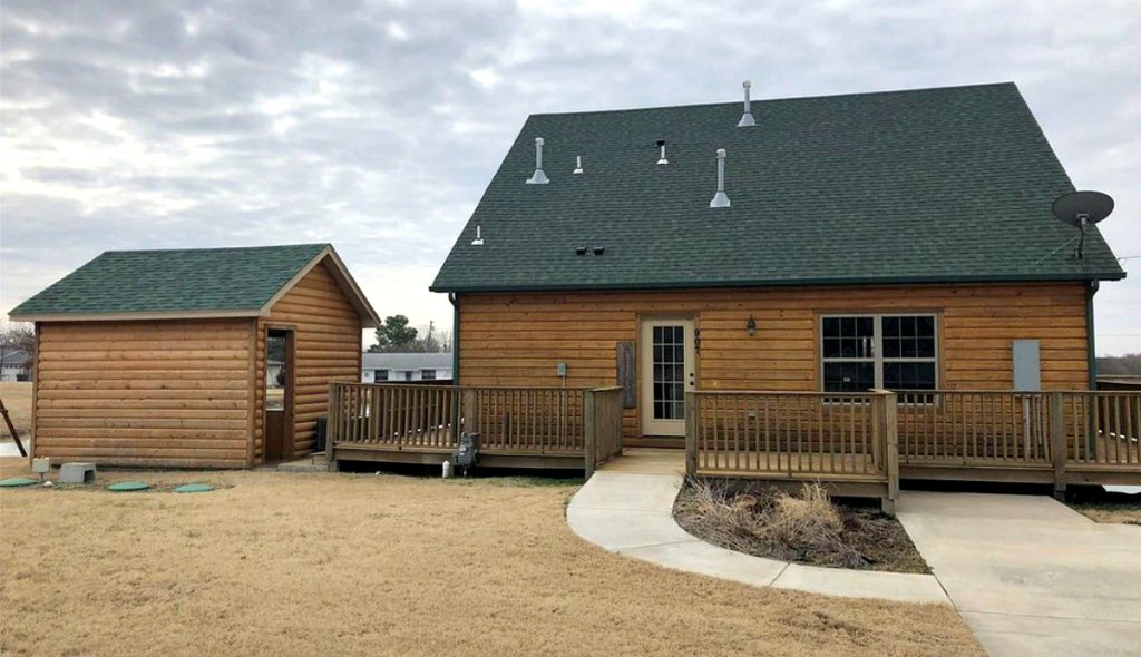 cabin house on pond