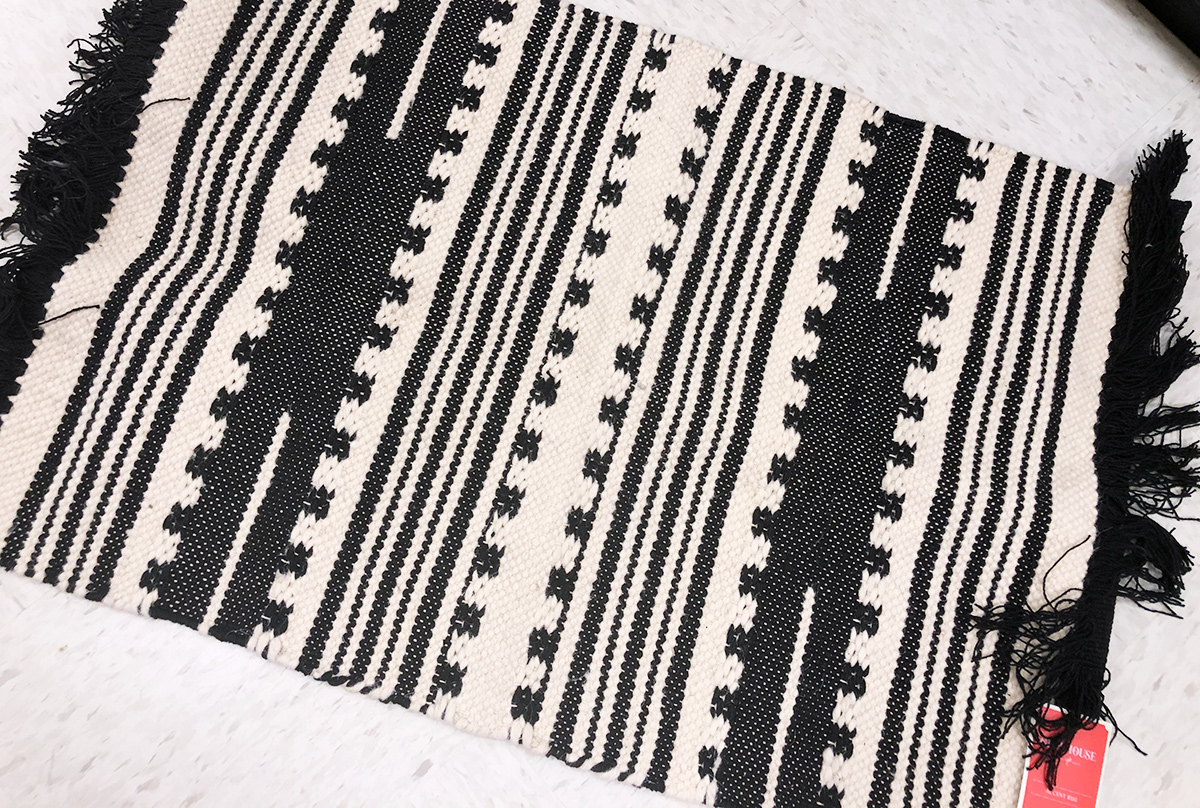 geometric black and white tassle rug from target