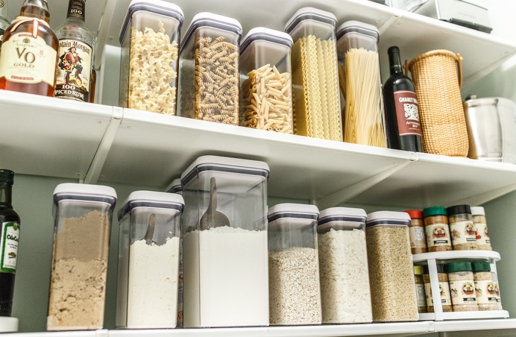 clean oxo containers on pantry shelf