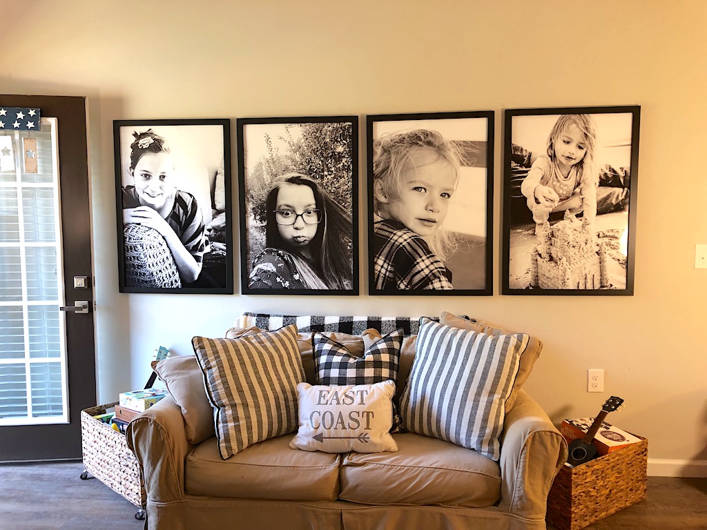 large photo gallery wall in living room 