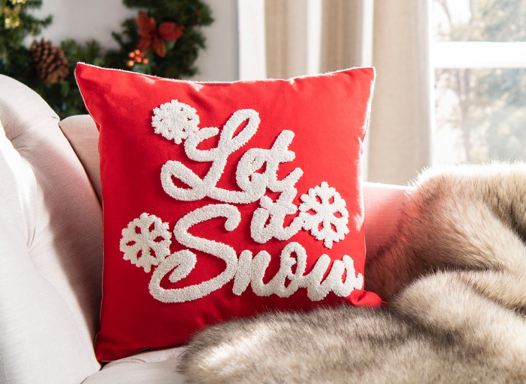 let it snow pillow on couch