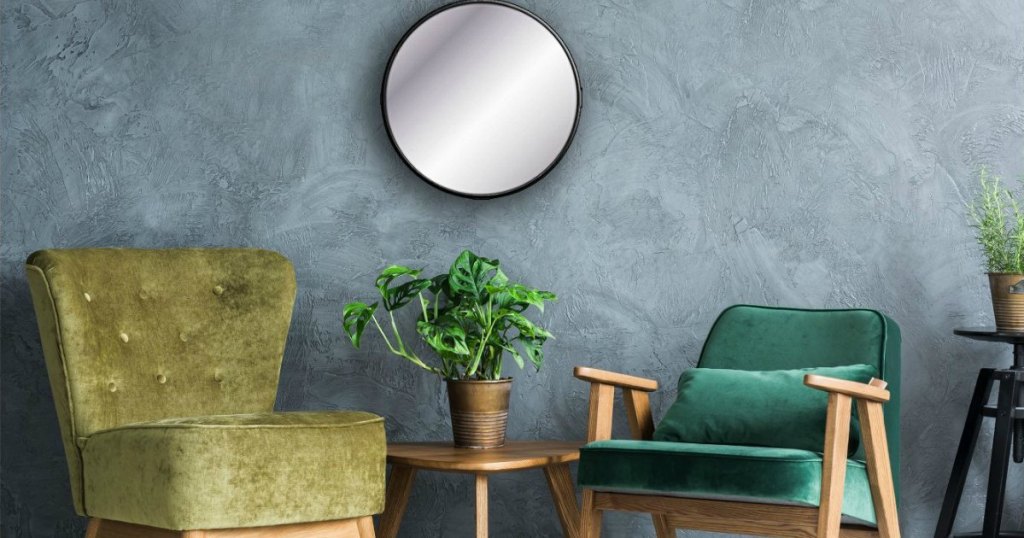 sitting area with circular decorative wall mirror 