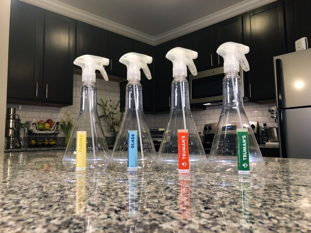 Truman Starter Kit with spray bottles on kitchen counter 