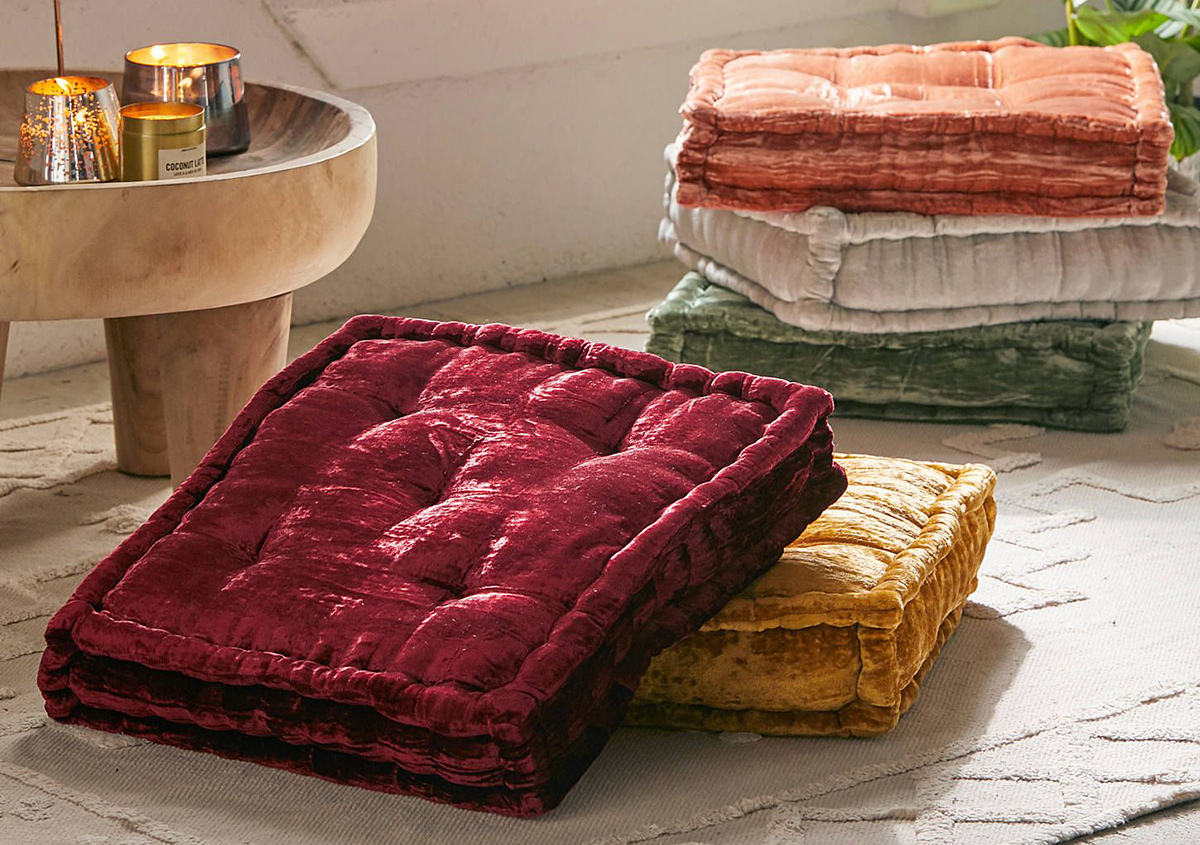 urban outfitters tufted floor pillows stacked