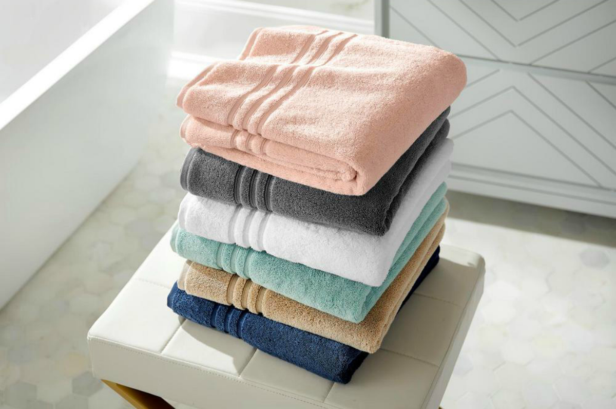 home decorators collection different color bath towels on counter