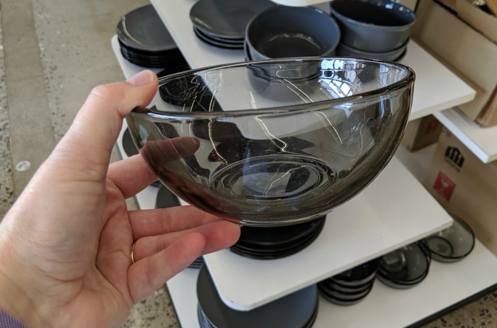 hand holding glass bowl