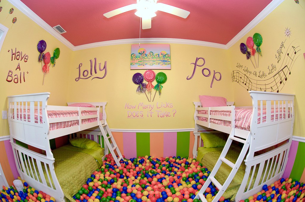 kids room with balls and bunk beds