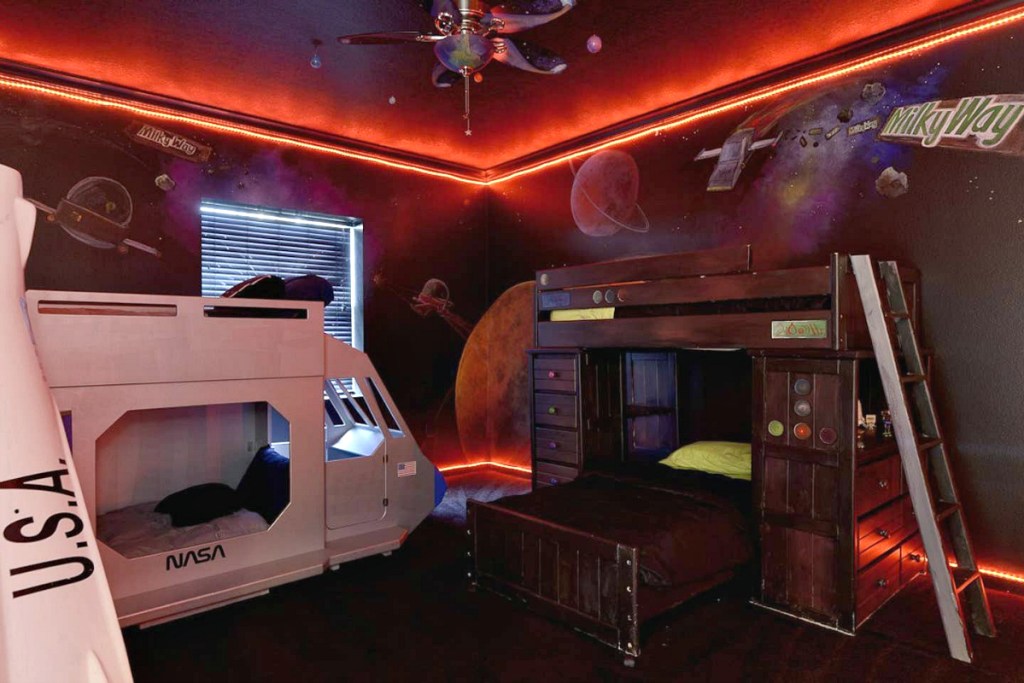 bed room with bunk bed and space theme