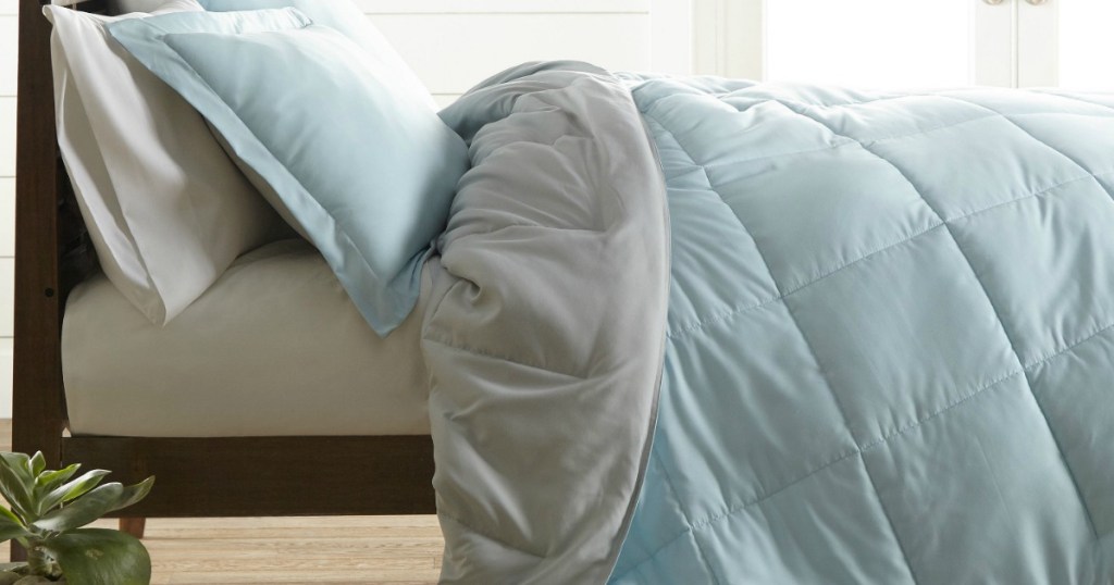 reversible comforter on bed 