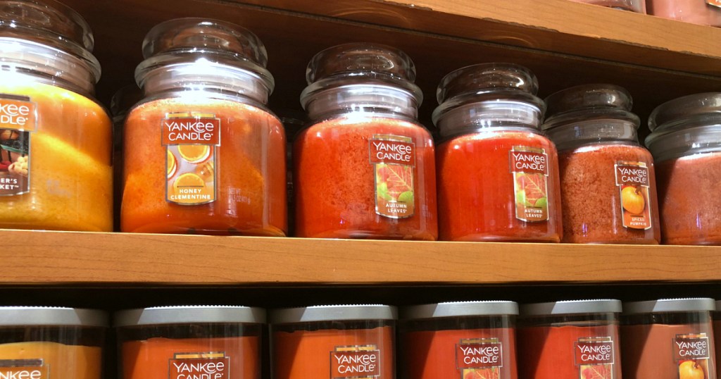 colorful jar candles on shelf