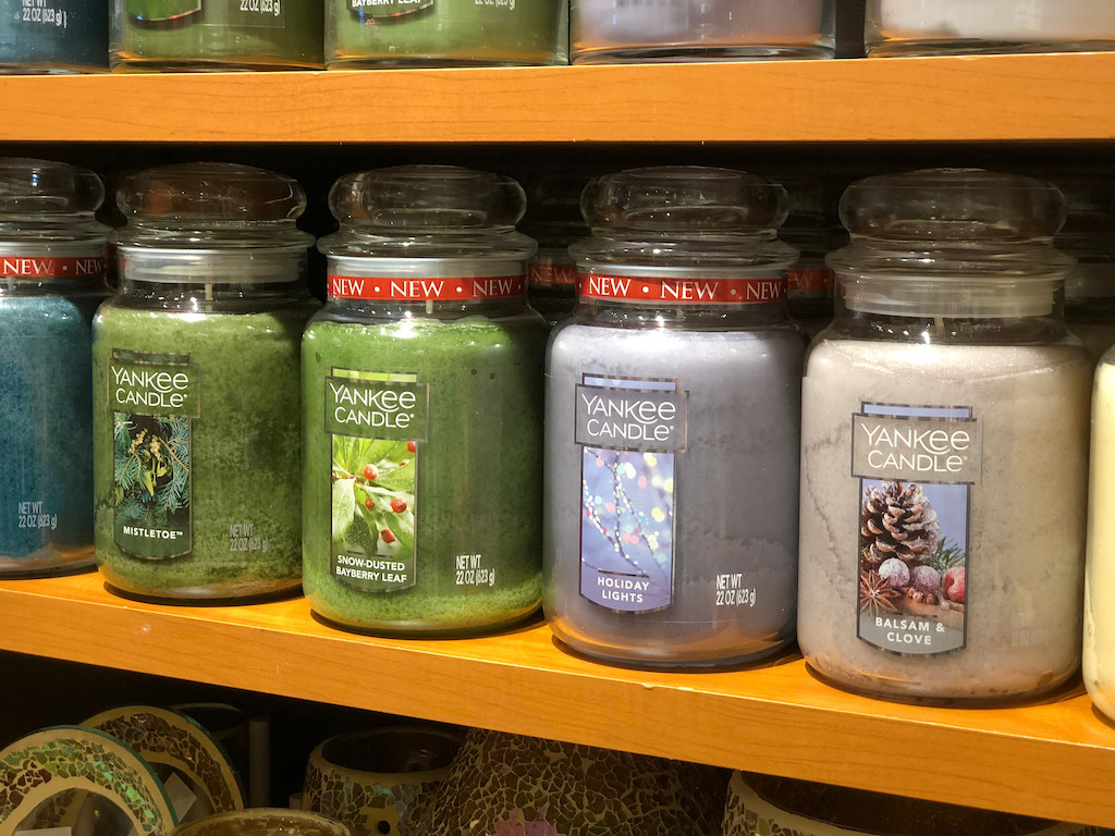 large jar Yankee Candles on shelf 